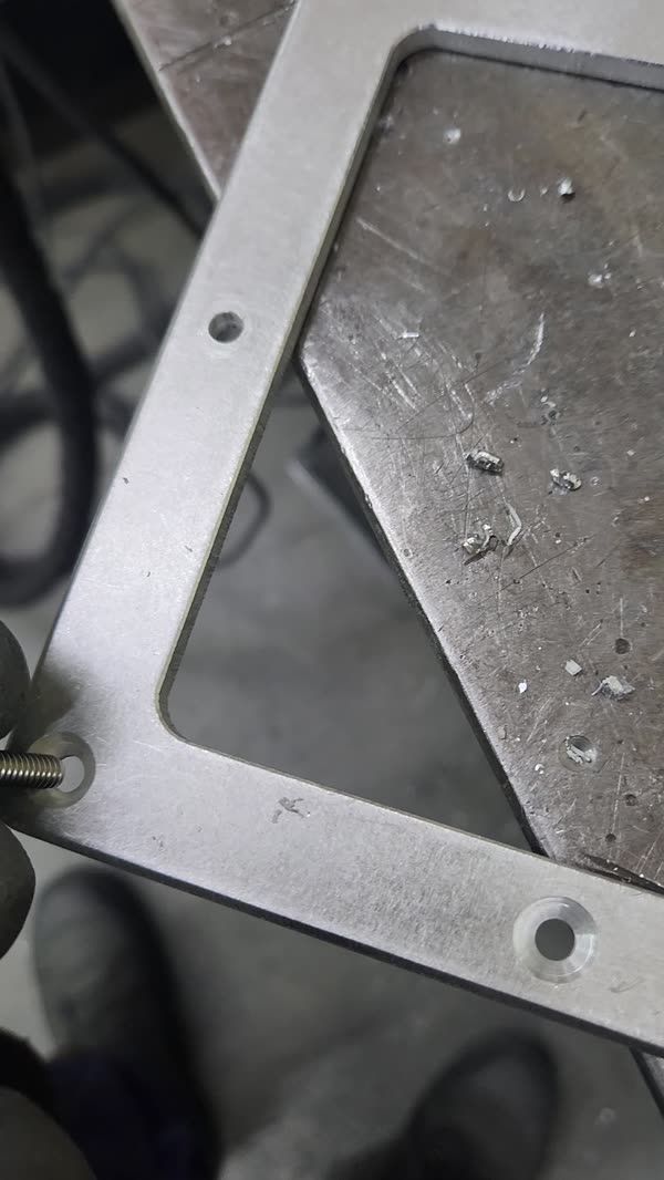 Cut steel plate bracket with lightening holes