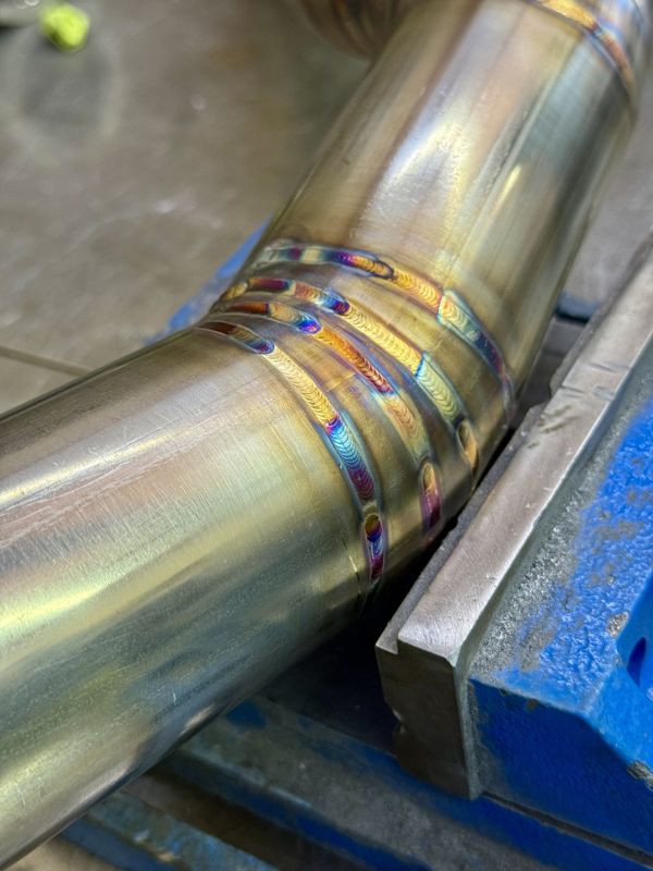 Close-up of a TIG weld on stainless pipe