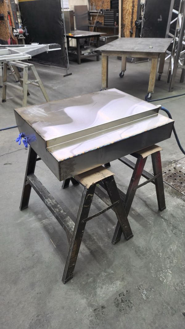 Fabricated stainless tank on sawhorses