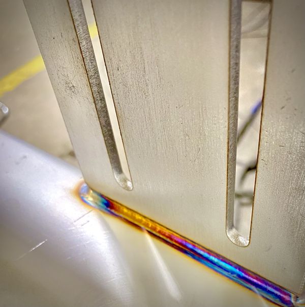 TIG weld on a slotted stainless bracket