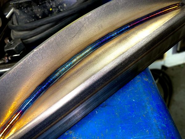 Colorful TIG bead along a steel channel