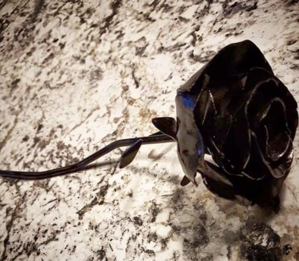 Hand-made steel rose art piece