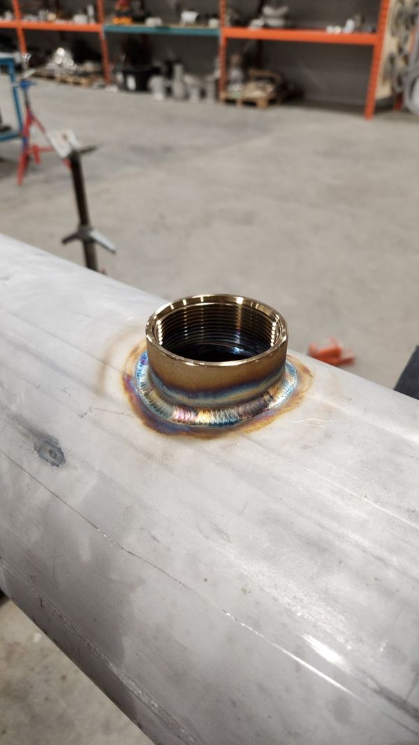 Port welded into a large stainless tube