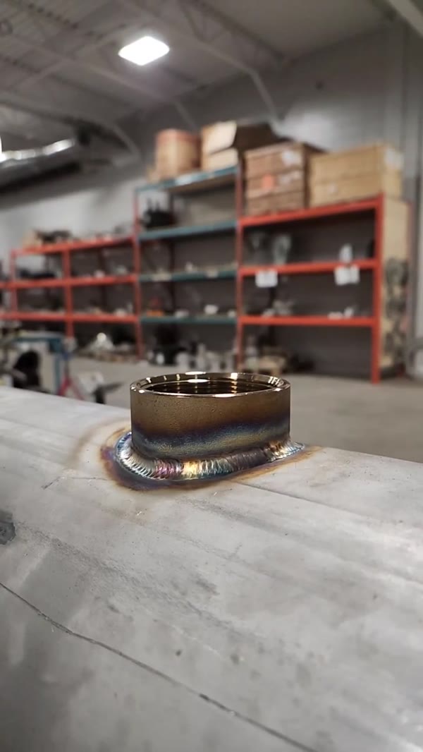 Welded port on a stainless tube