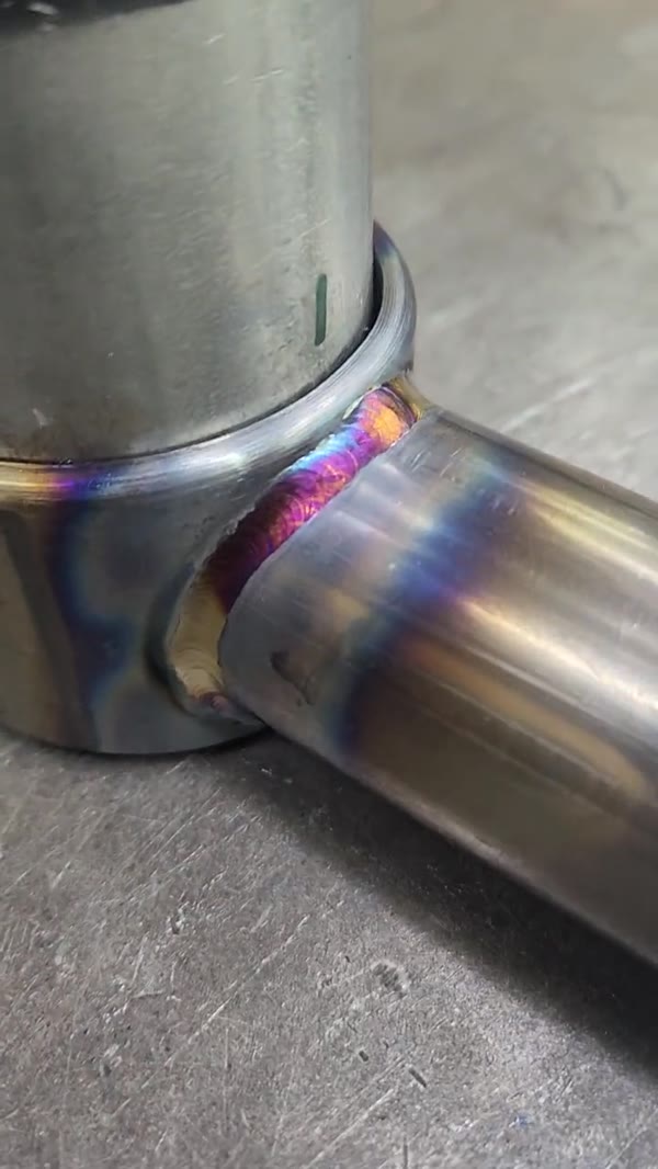 Colorful TIG weld on a tube junction