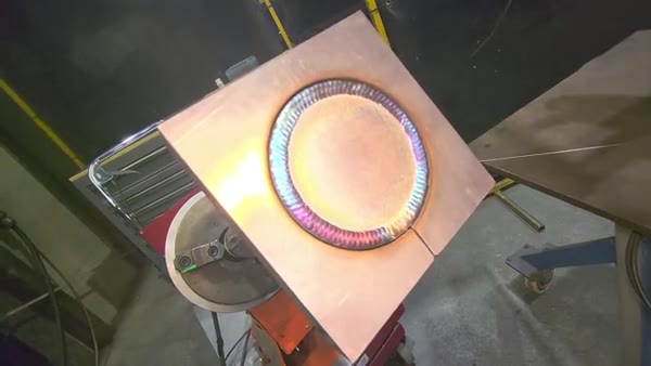 Ring TIG welded to a plate with heat tint