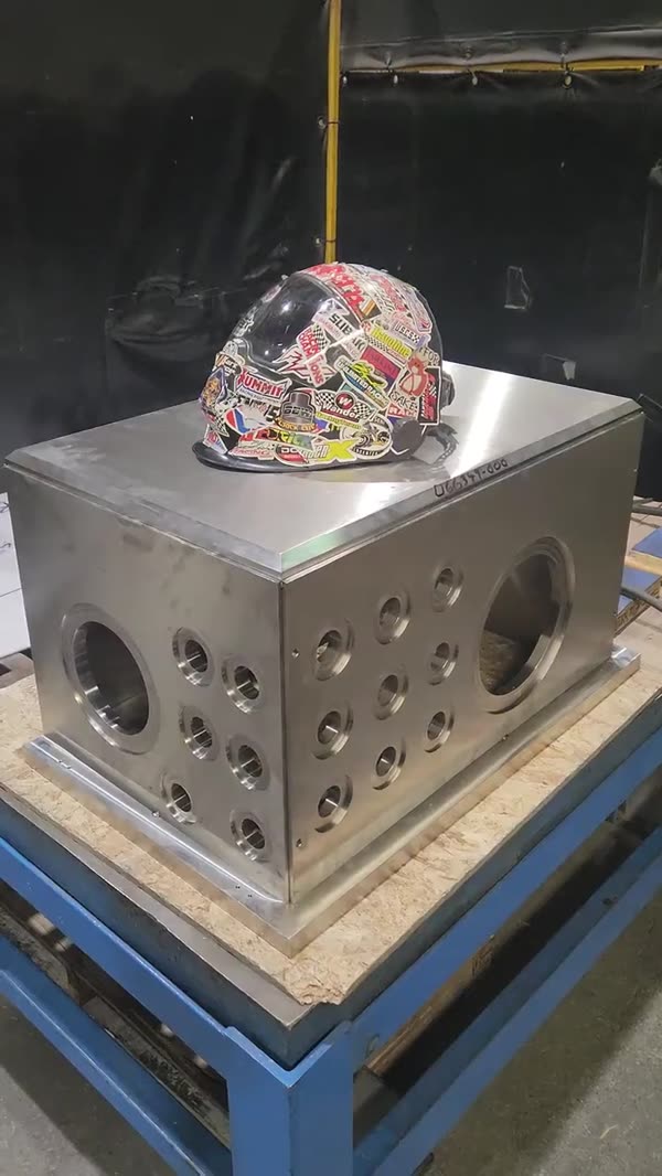 Welded stainless cube on the bench