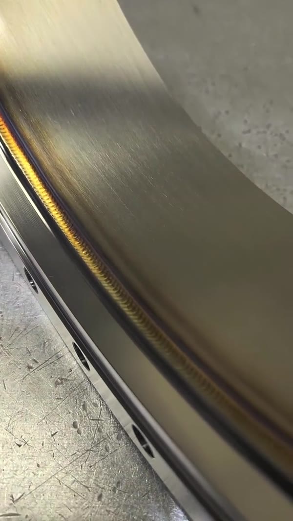 Colorful TIG weld on a large stainless ring